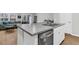 Stylish kitchen island with stainless steel dishwasher overlooks the living area with comfortable seating at 205 Cozy Brook Ct, Summerville, SC 29486