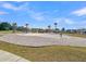Community park with a sand area, walkways, palm trees, benches, and shelter at 205 Cozy Brook Ct, Summerville, SC 29486