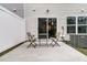 Relaxing patio area with table and chairs, perfect for outdoor dining and entertaining at 205 Cozy Brook Ct, Summerville, SC 29486