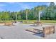 Community picnic area with lush green surroundings, perfect for outdoor dining and relaxation at 205 Cozy Brook Ct, Summerville, SC 29486