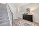 Elegant foyer features hardwood floors, staircase, and stylish decor at 215 Camellia Bloom Dr, Moncks Corner, SC 29461
