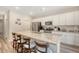 Modern kitchen featuring granite countertops, stainless steel appliances, and barstool seating at 215 Camellia Bloom Dr, Moncks Corner, SC 29461