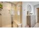Modern shower with glass enclosure, bench, and shelving, providing a spa-like experience within the bathroom at 215 Camellia Bloom Dr, Moncks Corner, SC 29461