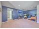 Large bonus room with TV, desk, and seating area at 215 Shortmarsh St, Summerville, SC 29486