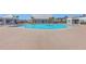 Community pool featuring a spacious deck and central pool house at 215 Shortmarsh St, Summerville, SC 29486