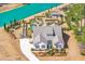 Stunning aerial view of a charming home with lush landscaping and a beautiful pond in a desirable community at 225 Camber Rd, Huger, SC 29450