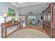 Comfortable living room featuring hardwood floors, wainscoting, and an open floor plan at 225 Camber Rd, Huger, SC 29450
