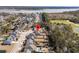 Aerial view of home showcasing its location, backyard, and proximity to nearby amenities like a lake at 225 Waning Way, Charleston, SC 29492