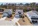 Aerial view of a charming neighborhood showcasing well-maintained homes and neatly landscaped yards at 225 Waning Way, Charleston, SC 29492