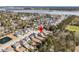 Aerial view of the neighborhood highlighting the home's location, landscaping, and nearby water access at 225 Waning Way, Charleston, SC 29492