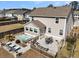 Beautiful backyard featuring a relaxing hot tub, an outdoor dining area, and a cozy fireplace for entertaining at 225 Waning Way, Charleston, SC 29492