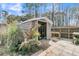 Backyard area featuring a storage shed and workbench space, perfect for gardening or hobby projects at 225 Waning Way, Charleston, SC 29492