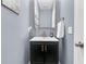 Well decorated powder room featuring a stylish vanity, modern faucet, and decorative wall art at 225 Waning Way, Charleston, SC 29492