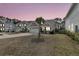 Lovely home featuring a two-car garage, inviting front porch, and well-maintained landscaping at 225 Waning Way, Charleston, SC 29492