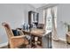 Charming home office with wooden desk, cabinets, and comfortable leather chair perfect for working from home at 225 Waning Way, Charleston, SC 29492