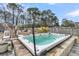 Backyard featuring a relaxing hot tub, perfect for unwinding outdoors at 225 Waning Way, Charleston, SC 29492
