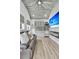 Cozy living space with a wet bar, fireplace, and a comfortable couch with stylish decor at 225 Waning Way, Charleston, SC 29492