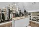 Well-organized walk-in closet with shelving and clothing racks, offering plenty of storage options at 225 Waning Way, Charleston, SC 29492