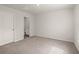 Cozy bedroom features neutral carpet and easy access to an ensuite bathroom at 229 Coral Sunset Way, Summerville, SC 29486