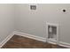 Bright laundry room with vinyl flooring and utility connections for washer and dryer at 229 Coral Sunset Way, Summerville, SC 29486