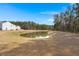 View of a pond and trees, with a house on the left at 229 Coral Sunset Way, Summerville, SC 29486