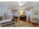 Comfortable bedroom with a ceiling fan, two windows, and space for an office area at 229 Gordon St, Charleston, SC 29403