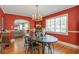 Charming dining room featuring hardwood floors and views into living space through an arched opening at 229 Gordon St, Charleston, SC 29403