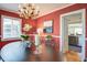 Lovely dining room featuring a chandelier and views into the kitchen at 229 Gordon St, Charleston, SC 29403