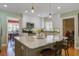 Charming kitchen featuring an island and open views to the dining area at 229 Gordon St, Charleston, SC 29403