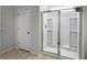 Bright bathroom featuring a walk-in shower with glass doors at 265 Celestial Blvd, Summerville, SC 29486