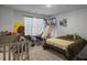 Cozy bedroom featuring a crib and other furniture at 265 Celestial Blvd, Summerville, SC 29486