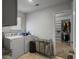 Convenient laundry room with a washer, dryer, and access to the closet at 265 Celestial Blvd, Summerville, SC 29486