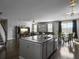 Open concept home with stainless steel kitchen, dining and living room area at 265 Celestial Blvd, Summerville, SC 29486