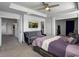 Comfortable main bedroom featuring natural light, soft upholstered furniture, and ceiling fan at 265 Celestial Blvd, Summerville, SC 29486