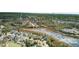 Aerial view showcasing the community's layout, bordering a marsh, and featuring a mix of housing and natural landscape at 2745 Oak Manor Dr, Mount Pleasant, SC 29466