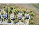 Aerial view showcasing the property's pool, neighborhood, and surrounding trees at 2745 Oak Manor Dr, Mount Pleasant, SC 29466