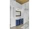 Beautiful bathroom with blue vanity, wood ceiling, and glass enclosed shower at 2745 Oak Manor Dr, Mount Pleasant, SC 29466