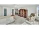 Spacious bedroom featuring a built-in entertainment center and a comfortable seating area at 2745 Oak Manor Dr, Mount Pleasant, SC 29466