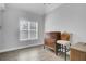 Bedroom featuring hardwood floors, a wooden dresser and a large window at 2745 Oak Manor Dr, Mount Pleasant, SC 29466