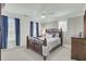 Comfortable bedroom with wood accents, soft carpet and natural light at 2745 Oak Manor Dr, Mount Pleasant, SC 29466