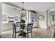 Eat-in kitchen featuring hardwood floors, a chandelier, and views of the living room at 2745 Oak Manor Dr, Mount Pleasant, SC 29466
