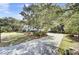 Long driveway with ample parking space leads to a beautifully maintained home at 2745 Oak Manor Dr, Mount Pleasant, SC 29466
