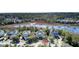 Charming houses with manicured lawns and tree-lined streets near a marsh, creating a serene residential atmosphere at 2745 Oak Manor Dr, Mount Pleasant, SC 29466