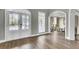 Foyer featuring hardwood floors, a double front door, transom window, and arched entryway at 2745 Oak Manor Dr, Mount Pleasant, SC 29466