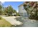 Spacious two-car garage with a wide driveway and well-kept landscaping at 2745 Oak Manor Dr, Mount Pleasant, SC 29466