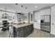 Kitchen with a black island, stainless steel appliances, and hardwood floors at 2745 Oak Manor Dr, Mount Pleasant, SC 29466