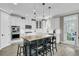 Spacious kitchen featuring a large island, white cabinets, and modern appliances at 2745 Oak Manor Dr, Mount Pleasant, SC 29466
