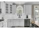 Bright kitchen featuring white cabinets, quartz countertops, stainless appliances and a garden window at 2745 Oak Manor Dr, Mount Pleasant, SC 29466