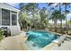 Inviting backyard pool features a waterfall, basketball hoop, and plenty of lounge space for relaxation and entertainment at 2745 Oak Manor Dr, Mount Pleasant, SC 29466
