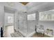 Bright bathroom with a glass shower, dual shower heads and tile surround at 2745 Oak Manor Dr, Mount Pleasant, SC 29466
